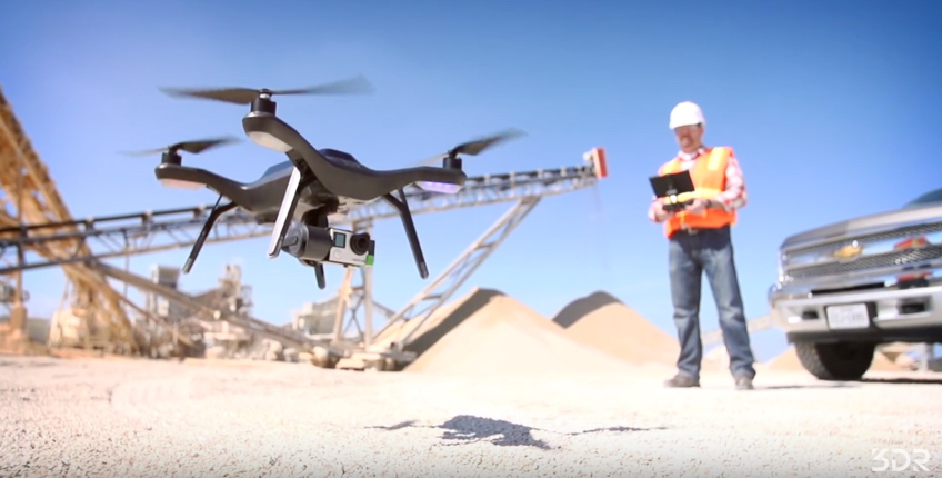 solo drone taking off on construction site